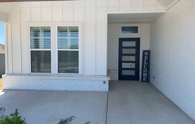 Beautiful home tucked in the rolling wooded hills of Catoosa