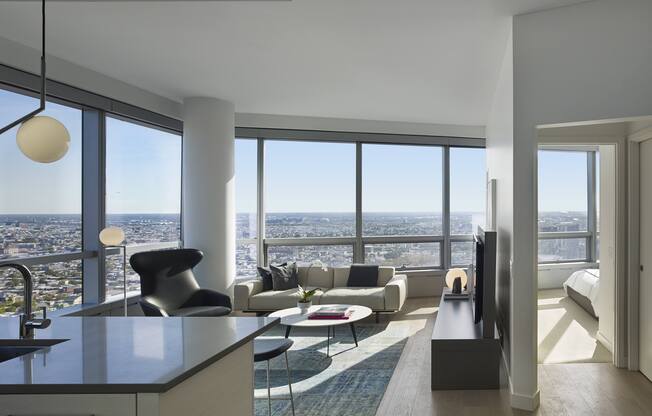 A modern living room with a view of the city.
