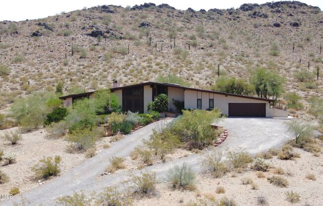 Beautiful and Incredibly rare, in-town property with elevated views, excess land & Phoenix Mountain Preserve!