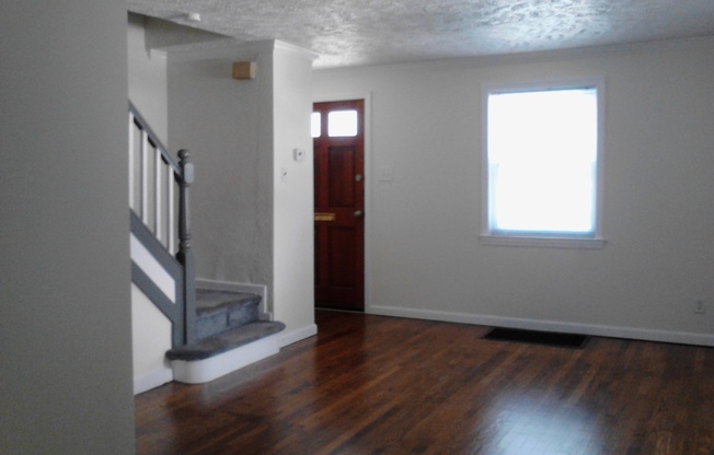 Cozy 2 Bedroom Semi-Attached Home on Quiet Cul-de-Sac! Recently Updated and Freshly Painted! Hardwood Floors!
