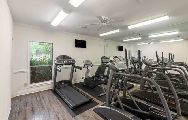 the gym at the heritage at legacy apartments  tx