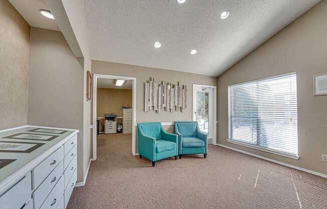A room with a white ceiling and a brown carpet.
