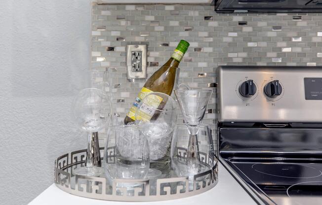 a bottle of wine sitting on top of a counter
