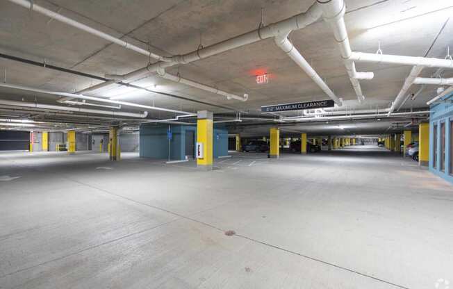 the parking garage is empty and empty of cars