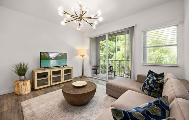 a living room with a couch and a tv