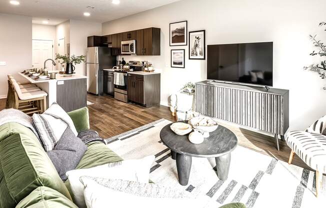 Studio, one two and three bedroom apartments and townhomes featuring open concept floor plans, dens, large windows, stainless steel appliances, quartz countertops, eat-in kitchens, pantries, LVT flooring and much more at The Trails at North Streams in Omaha, NE