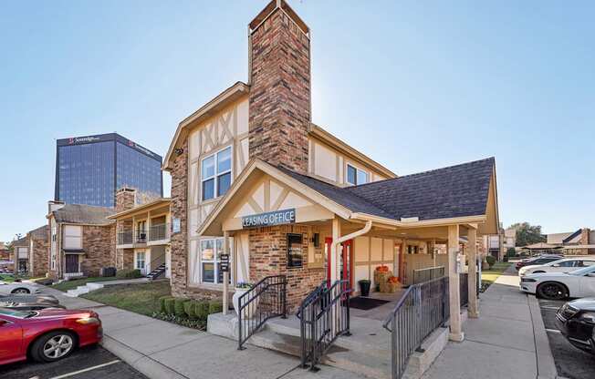 A building with a sign that says "VISITING OFFICE" is shown.