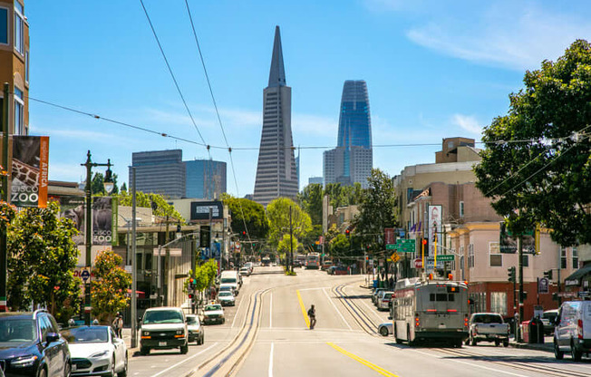 a city street with a view of the transamerica pyramid