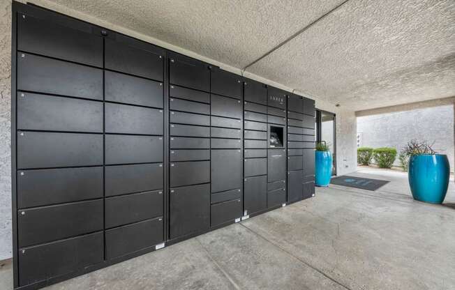 the garage of a home has a large wall of lockers