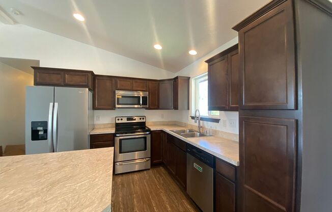 4 bedrooms 3 baths-Mead School District House with attached two car garage