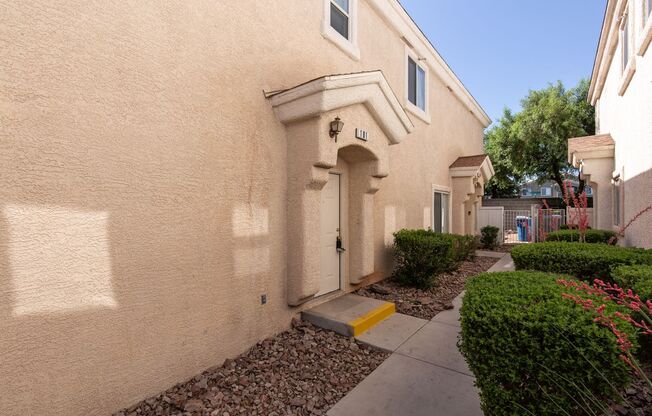 Two bedroom townhome with garage in gated Henderson community.
