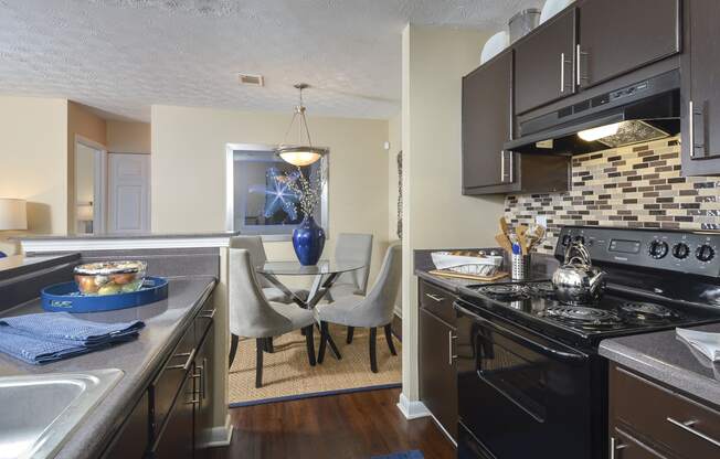 Kitchen appliances at Harvard Place Apartment Homes by ICER, Lithonia, GA, 30058