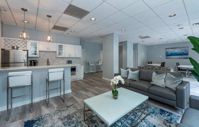 a living room with a couch and a table