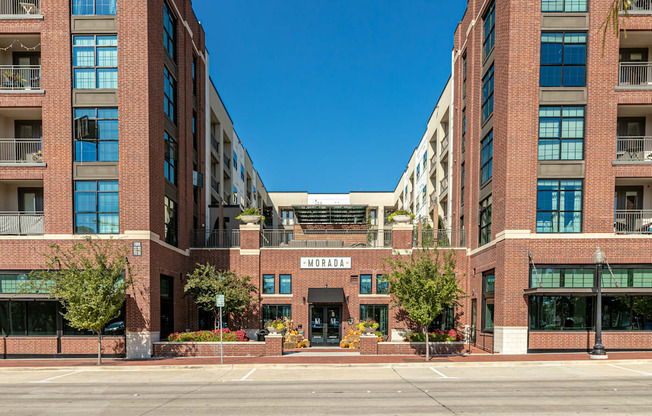 A large brick building with the word "WORLD" written on the front.
