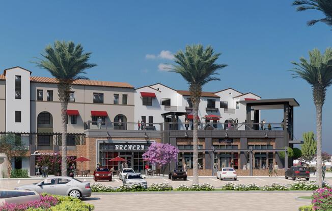 a group of palm trees with a building in the background