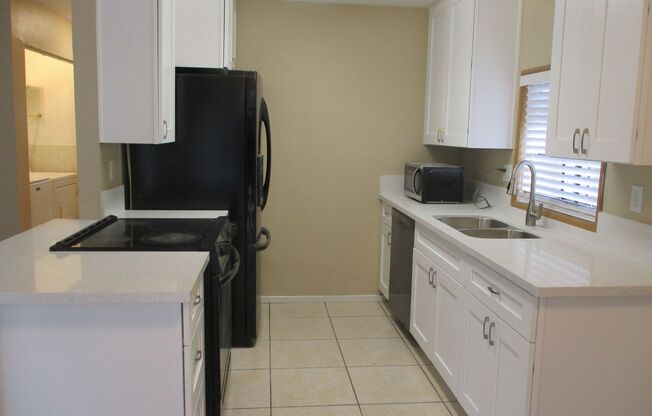 Very nice 2 bedroom 1.5 bath 1st floor condo