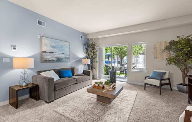 an open living room with a couch and a coffee table