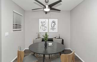 Model Dining Room with Wood-Style Flooring at The Meritage Apartments in Vallejo, CA.