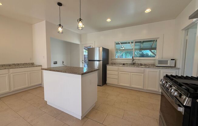 Charming Campbell 3 Bedroom 1 Bath Home with Backyard and Basement