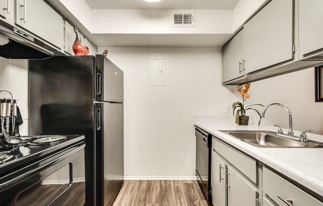 the preserve at ballantyne commons apartment kitchen with stainless steel appliances