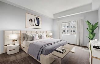 a bedroom with a large bed and a large window