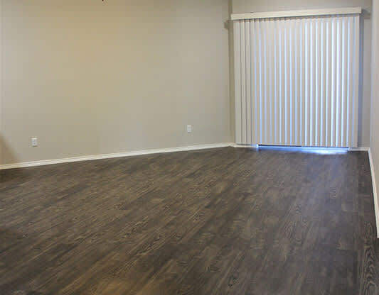 Living room with patio window at GEORGETOWN PARK, Georgetown, TX