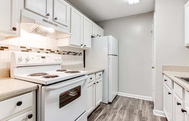 White appliances and white cabinets at Parkside at Sandy Springs Atlanta, GA