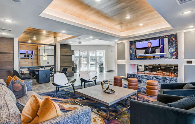 Game room and lounge with TV and gas fireplace