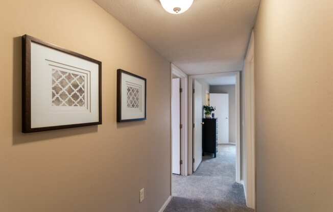 This is a photo of the hallway of the 890 square foot 2 bedroom, 2 bath Liberty at Washington Place Apartments in in Miamisburg, Ohio in Washington Township.