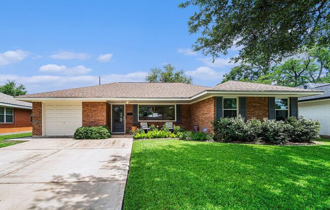 Beautifully Updated Home in Oak Forest with Spacious Yard and Prime Location