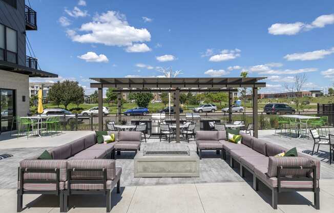 Outdoor pool side lounge - Nuvelo at Parkside Apartments