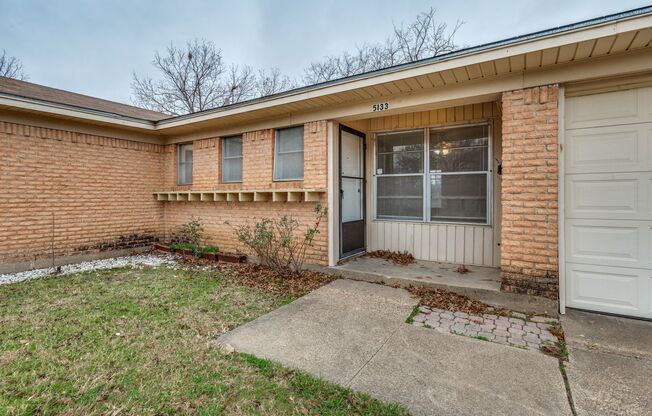 Three bedroom, 1.5 bathrooms, and a two car garage.