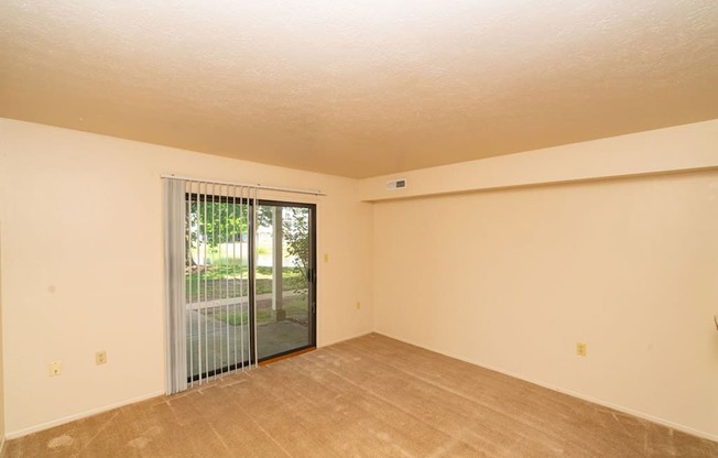 Living Room With Glass Door at North Pointe Apartments, Indiana, 46514