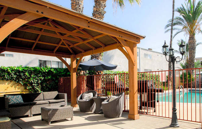 Gazebo and seating area by the pool.