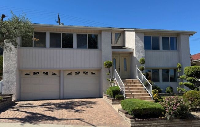 Newly Renovated 4 Bedroom 3 Bath Home with 2 Car Garage, Washer/Dryer hook-ups and Ocean/Harbor views