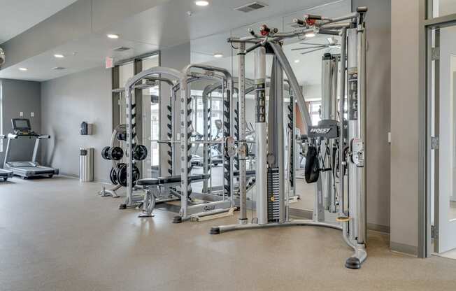 Large fitness center with free weights, weightlifting machines and cardio equipment at Ascend at Woodbury in MN
