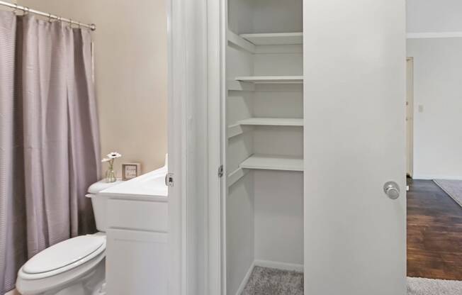 This is a photo of the hall linen closet of a 742 square foot, 2 bedroom apartment at Romaine Court Apartments in the Oakley neighborhood of Cincinnati, Ohio.