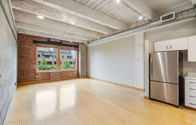 Historic Chown Pella Lofts - east facing studio w/parking/most utilities/rooftop deck