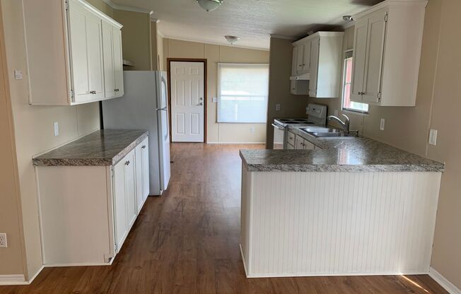 Spacious 3 Bed/2 Bath Home - Large Corner Lot - Split Floor Plan - 2 Car Carport - No Pets