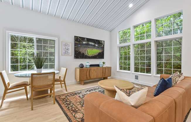 clubroom with a couch and a table with chairs