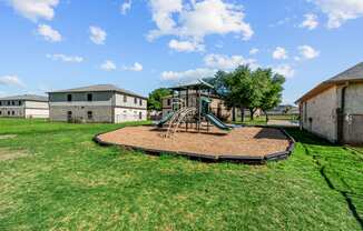 Affordable Apartments in Austin, TX for Rent – Huntington Meadows- a playground with a swing set