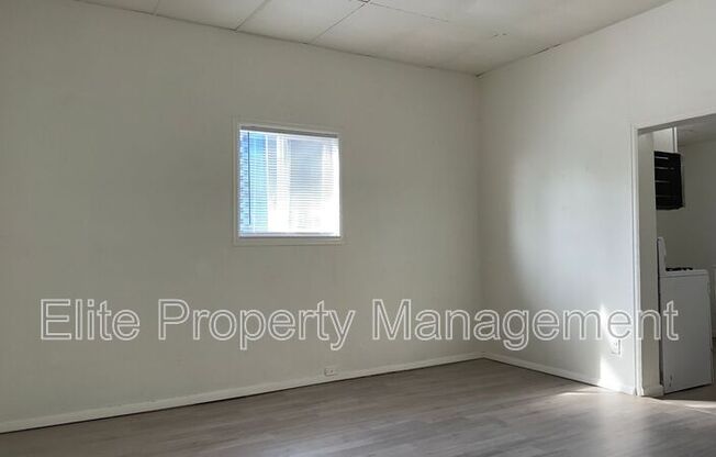 1015 W 13 ST