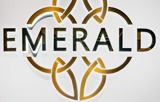 a logo for emerald industries