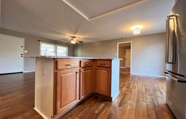 PRICE IMPROVEMENT!!  NORTHWEST RANCHER WITH OPEN LIVING AND KITCHEN AREA: 3 BDRMS 2 BATHS