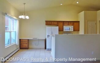 Bright & Modern 2-Bedroom Townhome with Open Floor Plan and Spacious 2-Car Garage