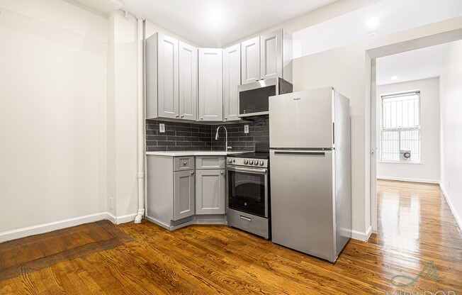 332 E 9 ST