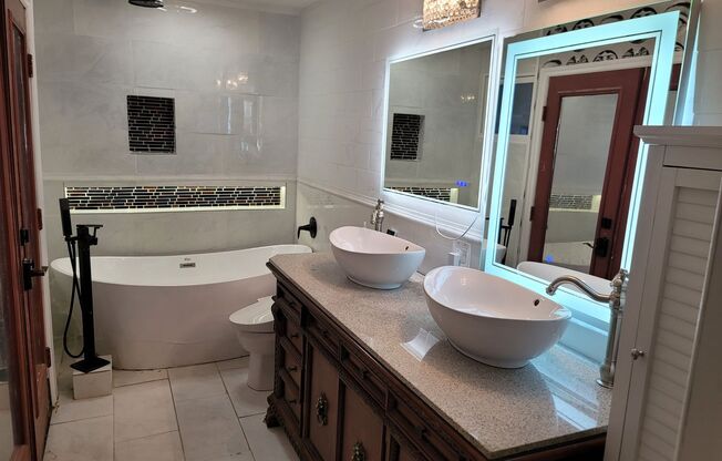 Single story centrally located with mother-in-law apartment included.