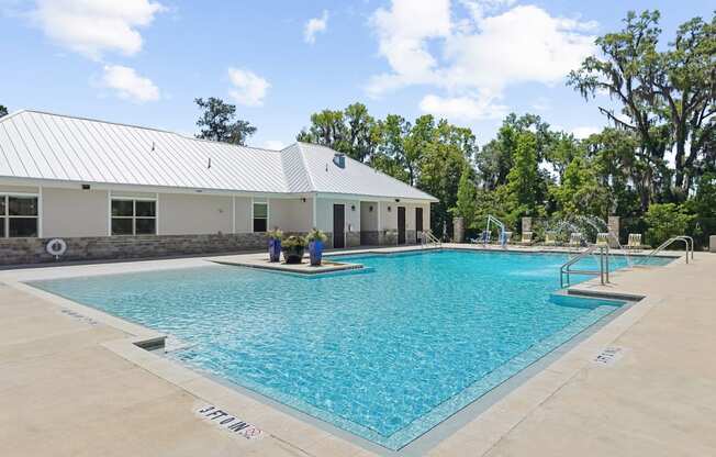 Swimming pool behind the leasing office at Capital Grand Apartments in Tallahassee, FL