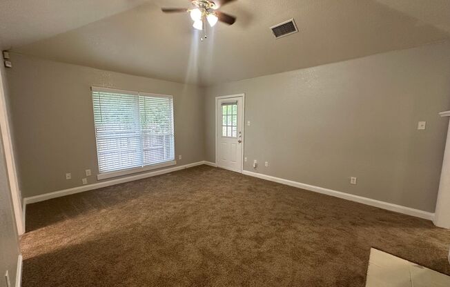 Charming 3-Bedroom Home with Spacious Living & Backyard!
