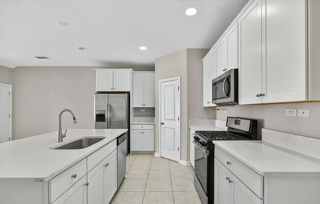 Luxury 3-Bedroom, 2.5 Bath Townhome with Modern Finishes & Prime Location! Gated Community!